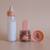 Coffret repas petit pot et biberon magiques pour poupée pain d'épices Blanc, marron, rose 2 - vertbaudet enfant 