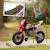 Moto cross électrique dirt bike enfant 12v 2 moteurs 2 vitesses 2,4-5 km/h max. Musiques Rouge+Vert 3 - vertbaudet enfant 