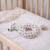 Hochet tricoté en coton bio Beige, chien+Beige, singe+Bleu, ourson+Gris, dino+Multicolore, lapin+Multicolore, toucan+Rose 3 - vertbaudet enfant 