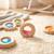 Hochet sensoriel donut calme Bleu+Jaune+Orange+Rose+Rouge+Turquoise+Vert+Violet 7 - vertbaudet enfant 
