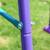 Balançoire 3 agrès portique avec 2 balançoires et face à face dim. 2,8l x 1,4l x 1,78h m métal époxy anticorrosion Vert+Violet 11 - vertbaudet enfant 