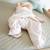 Couverture enveloppante en coton bio motif pois en relief frosty almond Beige amande 2 - vertbaudet enfant 